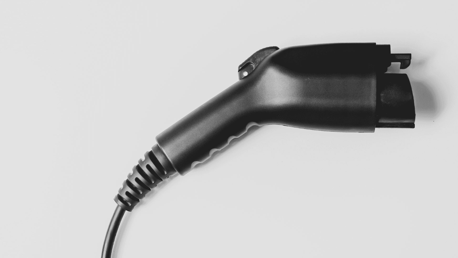 Level 2 EV charger installed on a residential garage wall in Southern Maine