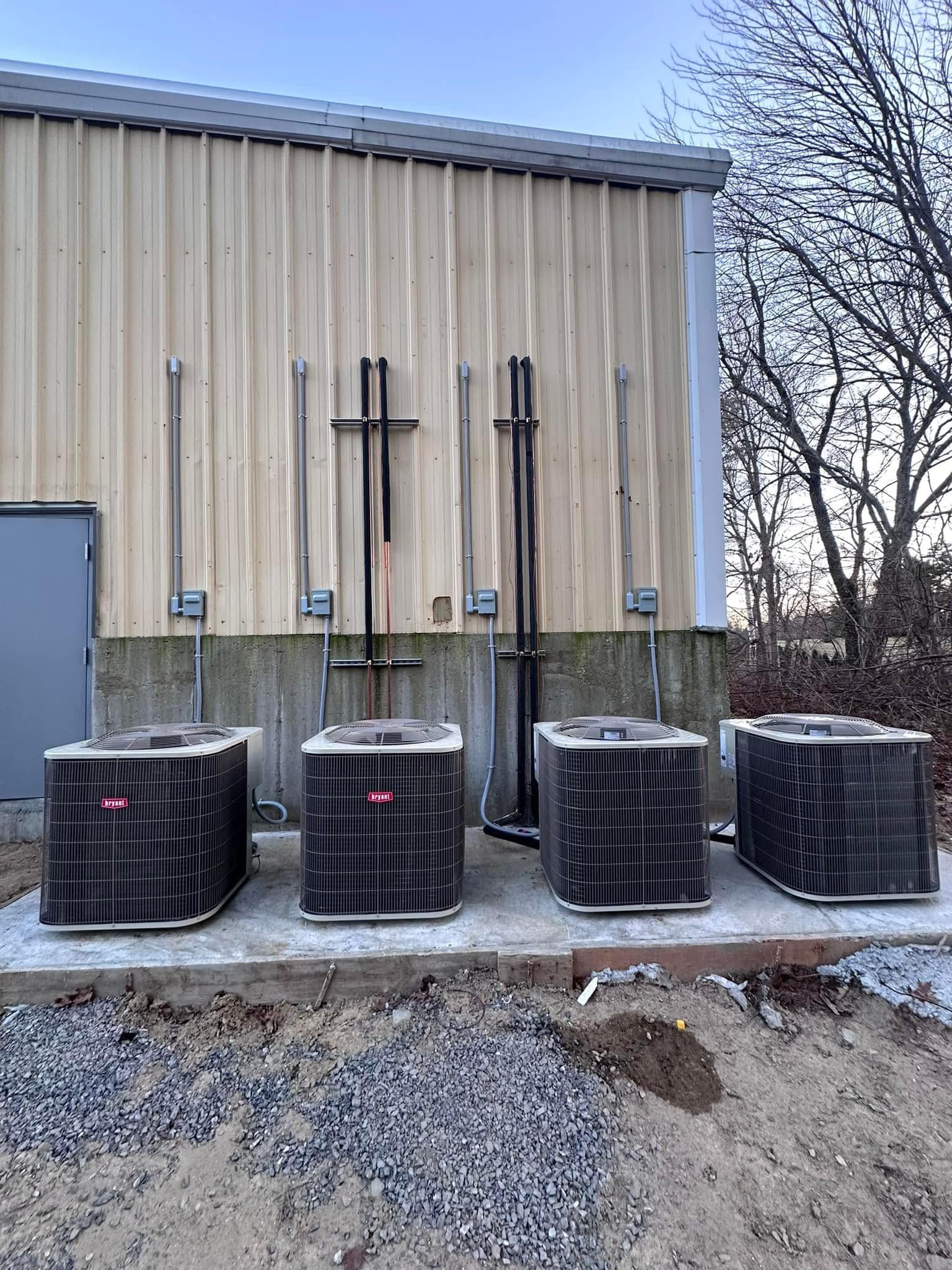 Whole-house standby generator installed outside a Southern Maine home by Goodnow Electric